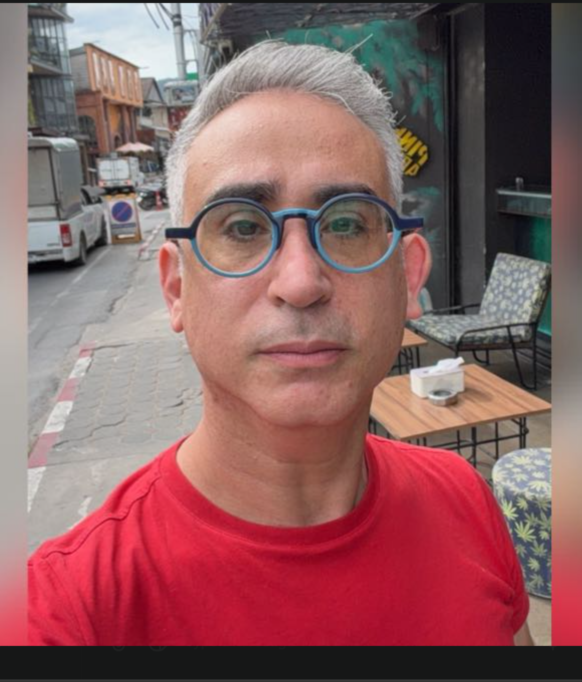 Your helper with silver hair and blue glasses